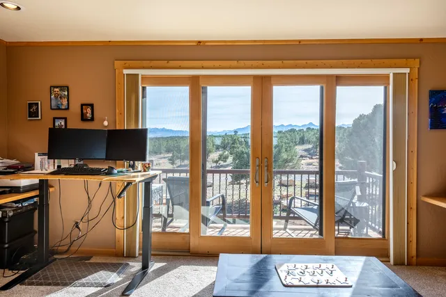 a view of a livingroom with furniture