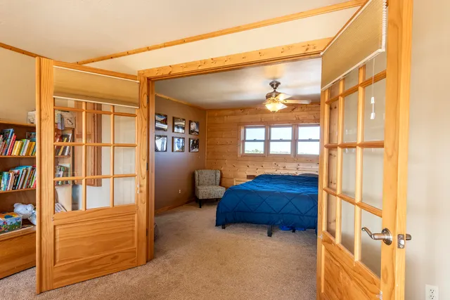 a room that has a bed and a window