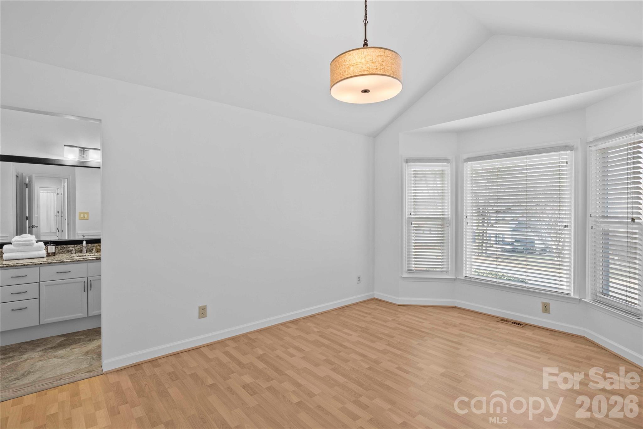 21133 Rio Oro Drive Cornelius, NC 28031 - Photo 19 of 41 an empty room with windows