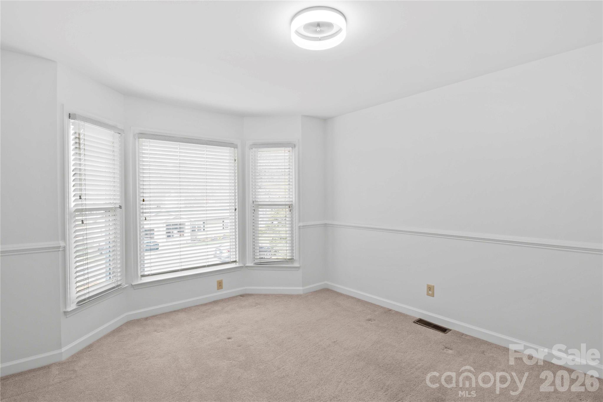 21133 Rio Oro Drive Cornelius, NC 28031 - Photo 23 of 41 an empty room with a window