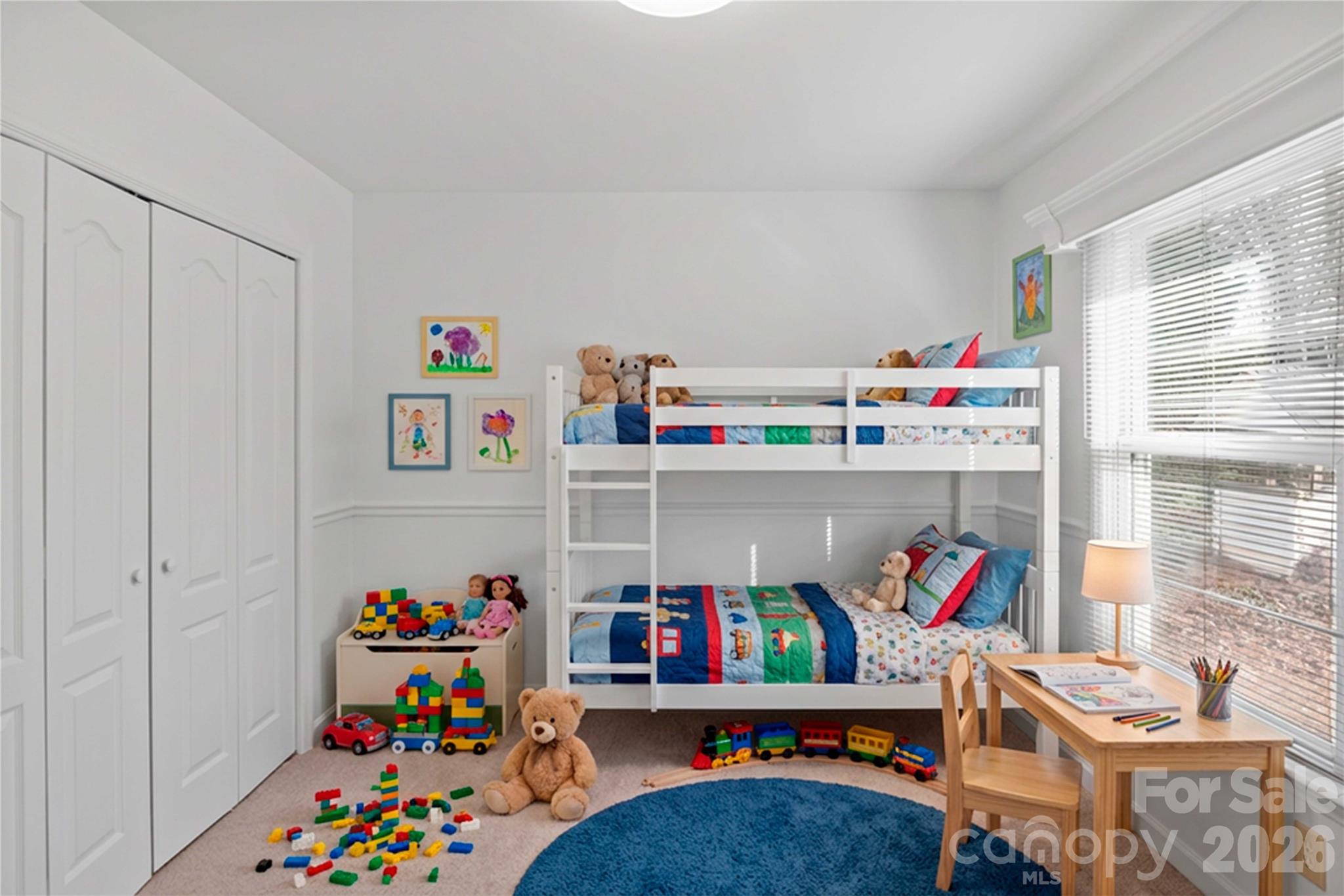 21133 Rio Oro Drive Cornelius, NC 28031 - Photo 26 of 41 a room with toys and a book shelf