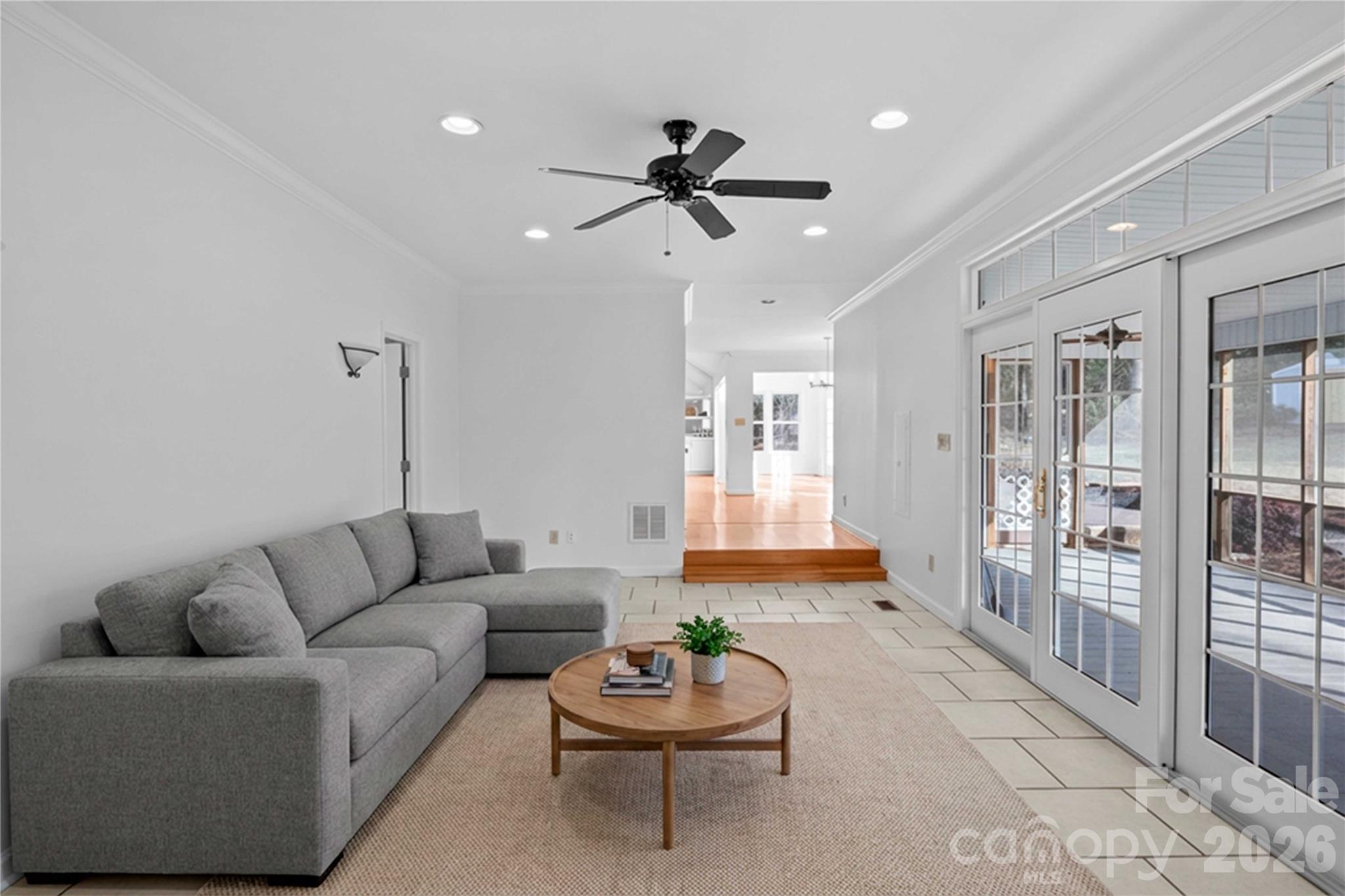 21133 Rio Oro Drive Cornelius, NC 28031 - Photo 31 of 41 a living room with furniture and a potted plant