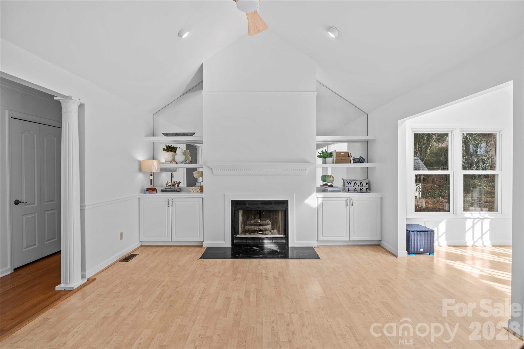 21133 Rio Oro Drive Cornelius, NC 28031 - Photo 10 of 41 a view of a livingroom with a fireplace