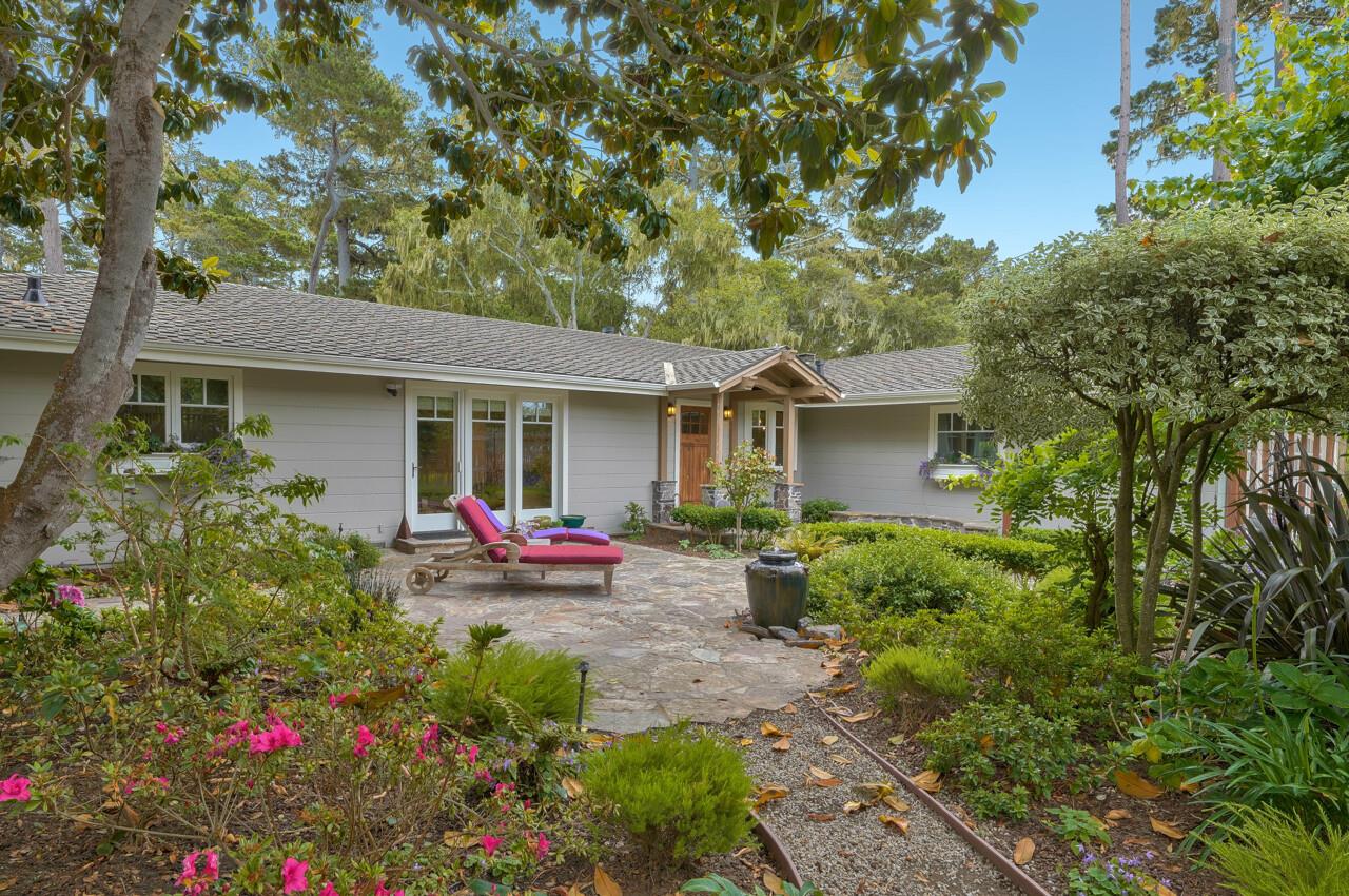 3115 Middle Ranch Road Pebble Beach, CA 93953 - Photo 3 of 15 a view of a house with sitting area and garden