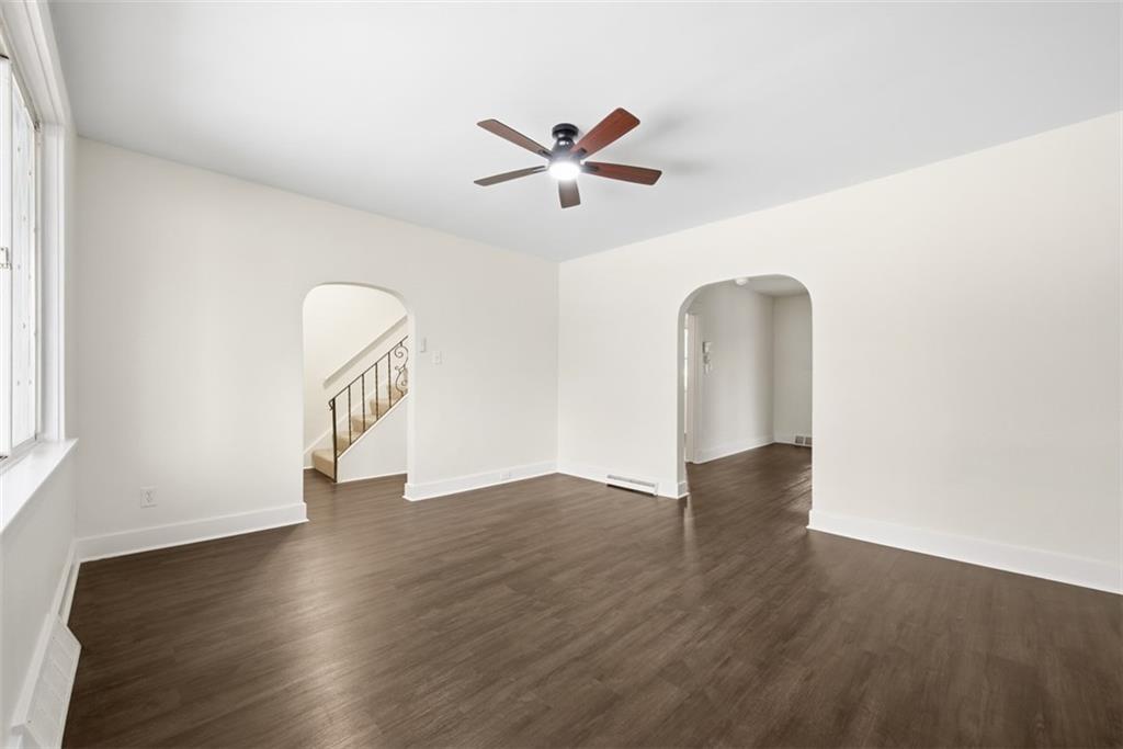 127 Duffland Street Pittsburgh, PA 15210 - Photo 11 of 36 a view of a hallway with wooden floor