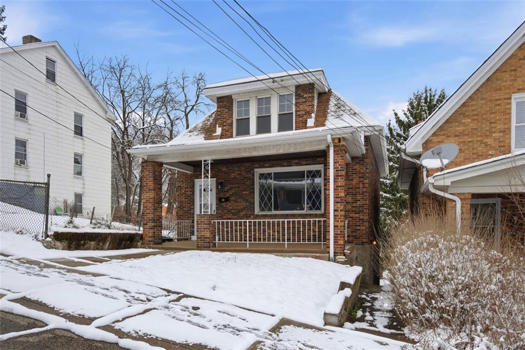 127 Duffland Street Pittsburgh, PA 15210 - Photo 2 of 36 a front view of a house with a yard