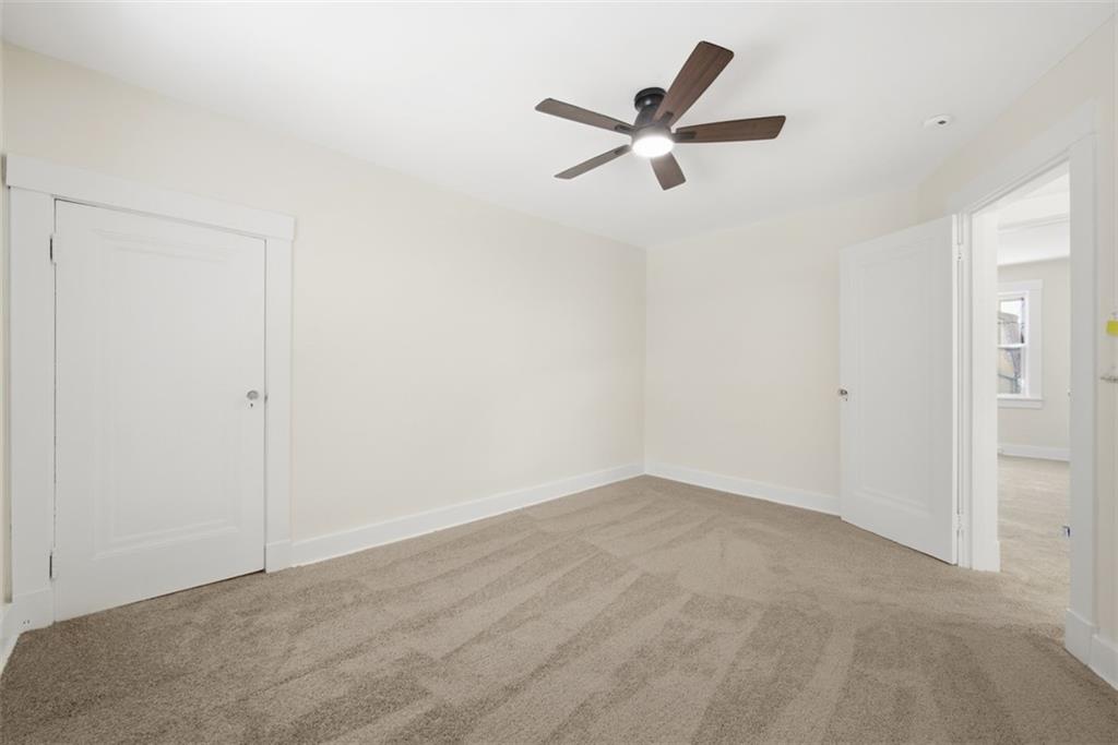 127 Duffland Street Pittsburgh, PA 15210 - Photo 23 of 36 a view of a ceiling fan with wooden floor