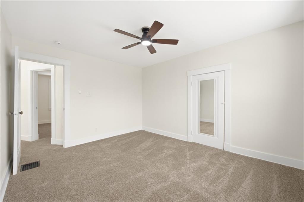 127 Duffland Street Pittsburgh, PA 15210 - Photo 26 of 36 an empty room with closet and windows