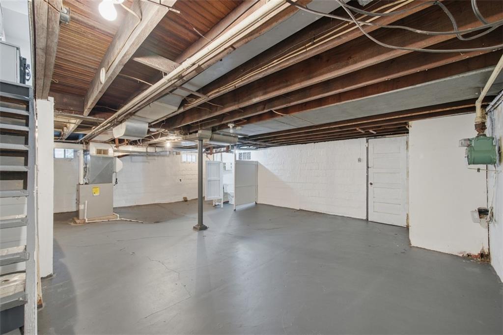 127 Duffland Street Pittsburgh, PA 15210 - Photo 29 of 36 a view of empty room with wooden walls