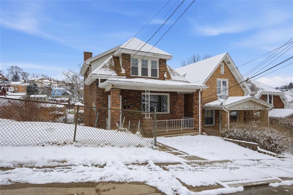 127 Duffland Street Pittsburgh, PA 15210 - Photo 3 of 36 a front view of a house with a yard