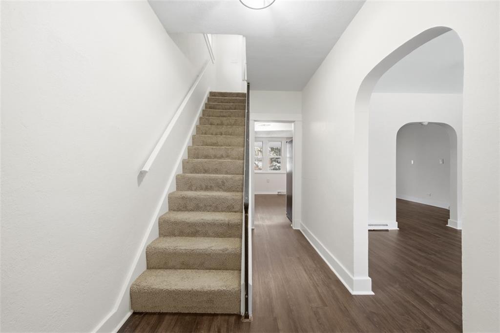 127 Duffland Street Pittsburgh, PA 15210 - Photo 7 of 36 a view of an entryway with wooden floor