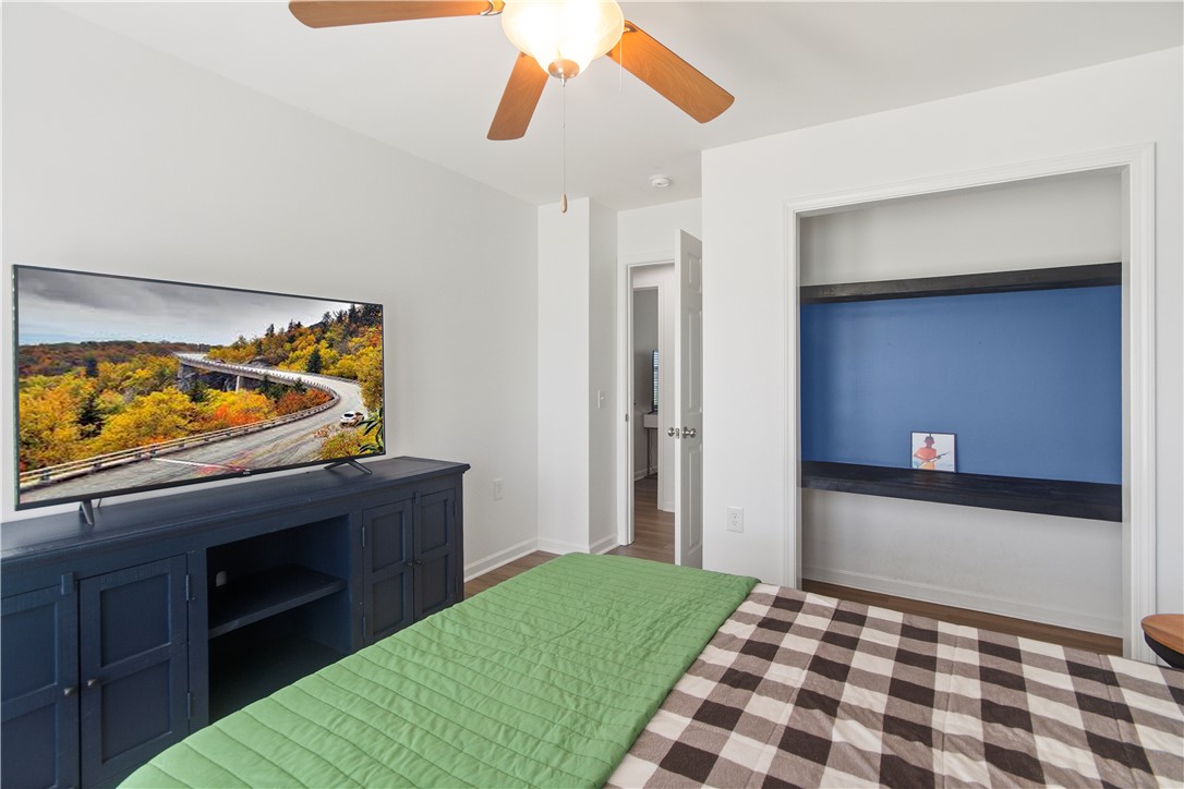 2900 Highway 187 Anderson, SC 29626 - Photo 26 of 41 A well-lit bedroom offering a cozy retreat with thoughtful storage and ceiling fan comfort.