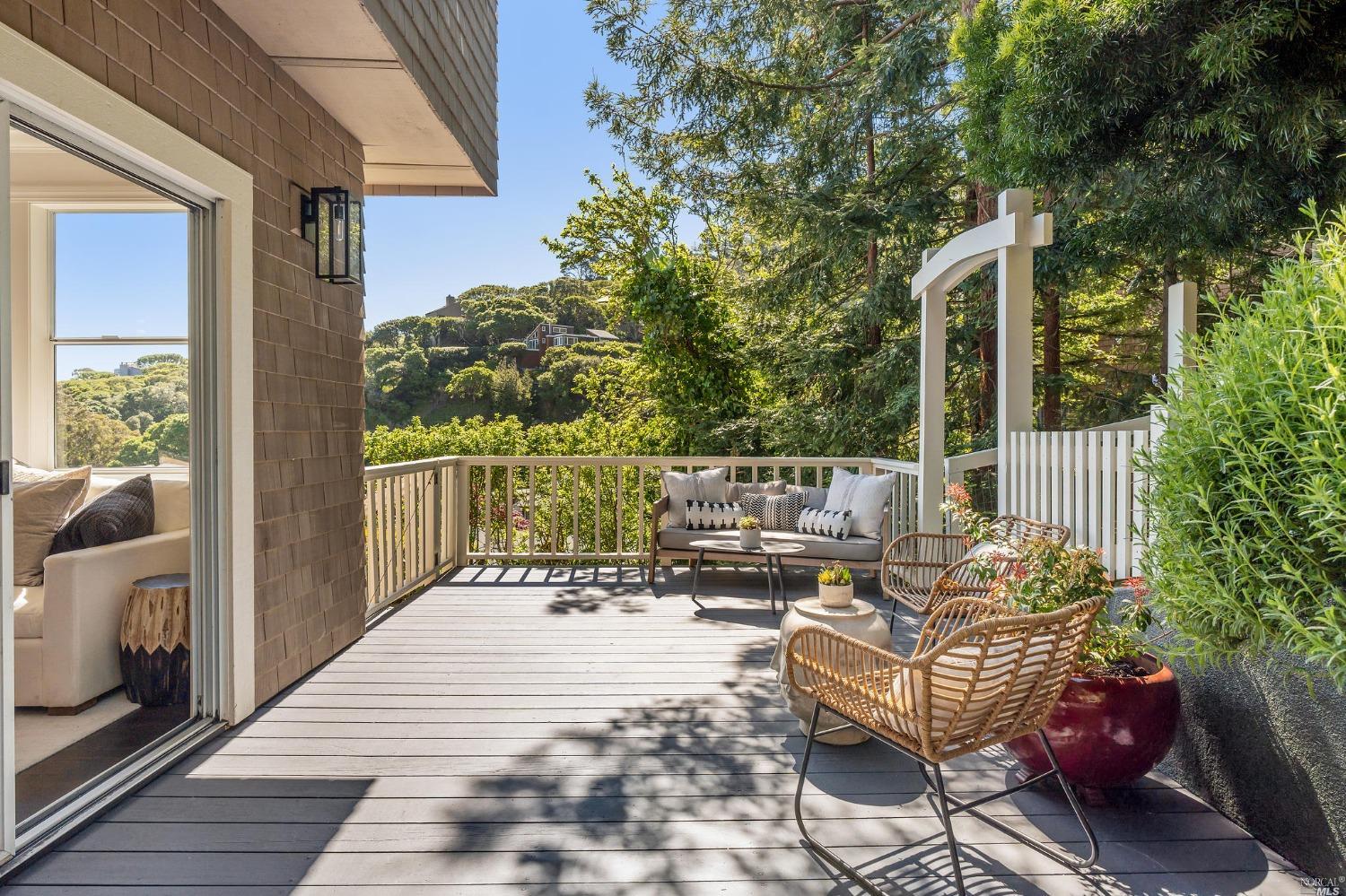 2 Spring Hill Circle Sausalito, CA 94965 - Photo 14 of 57 a view of a patio with two chairs and a table