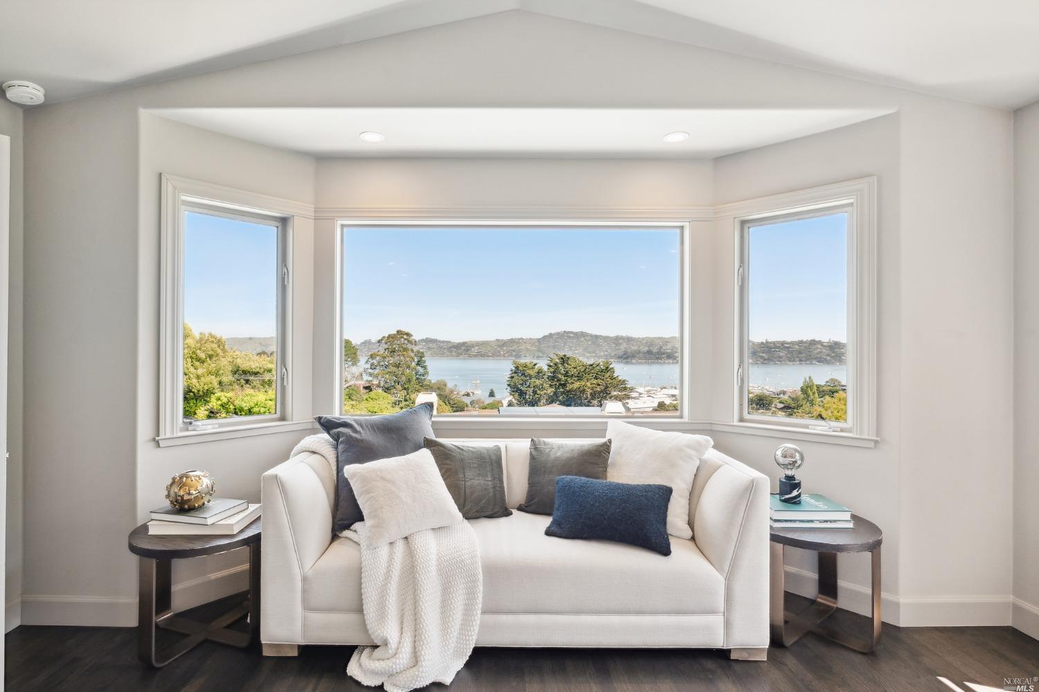 2 Spring Hill Circle Sausalito, CA 94965 - Photo 32 of 57 a living room with furniture and a large window