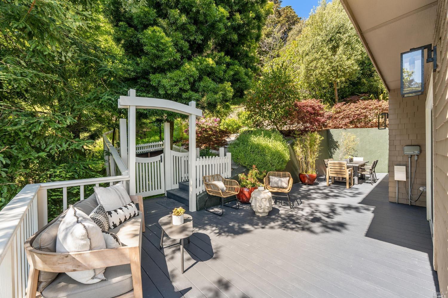 2 Spring Hill Circle Sausalito, CA 94965 - Photo 51 of 57 a view of a patio with table and chairs potted plants and large tree