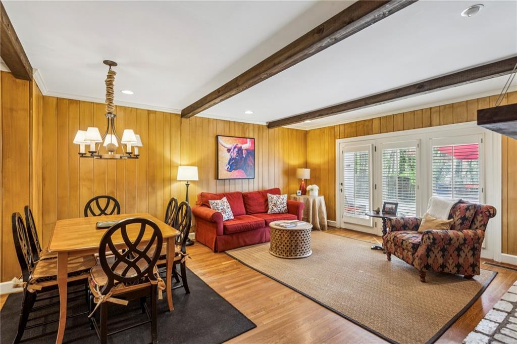 3384 Pine Meadow Road Northwest Atlanta, GA 30327 - Photo 12 of 56 a living room with furniture kitchen view and large windows