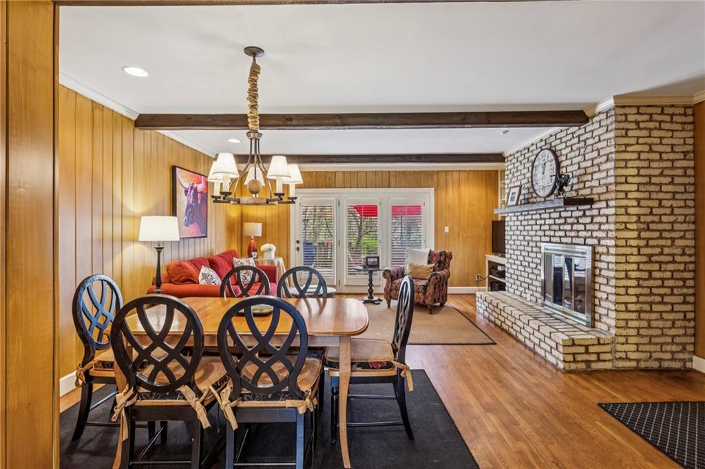3384 Pine Meadow Road Northwest Atlanta, GA 30327 - Photo 13 of 56 a view of a dining room with furniture window and outside view