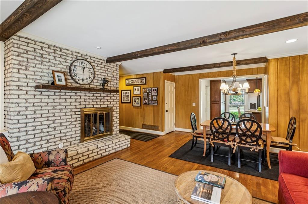 3384 Pine Meadow Road Northwest Atlanta, GA 30327 - Photo 15 of 56 a living room with furniture fireplace and flat screen tv