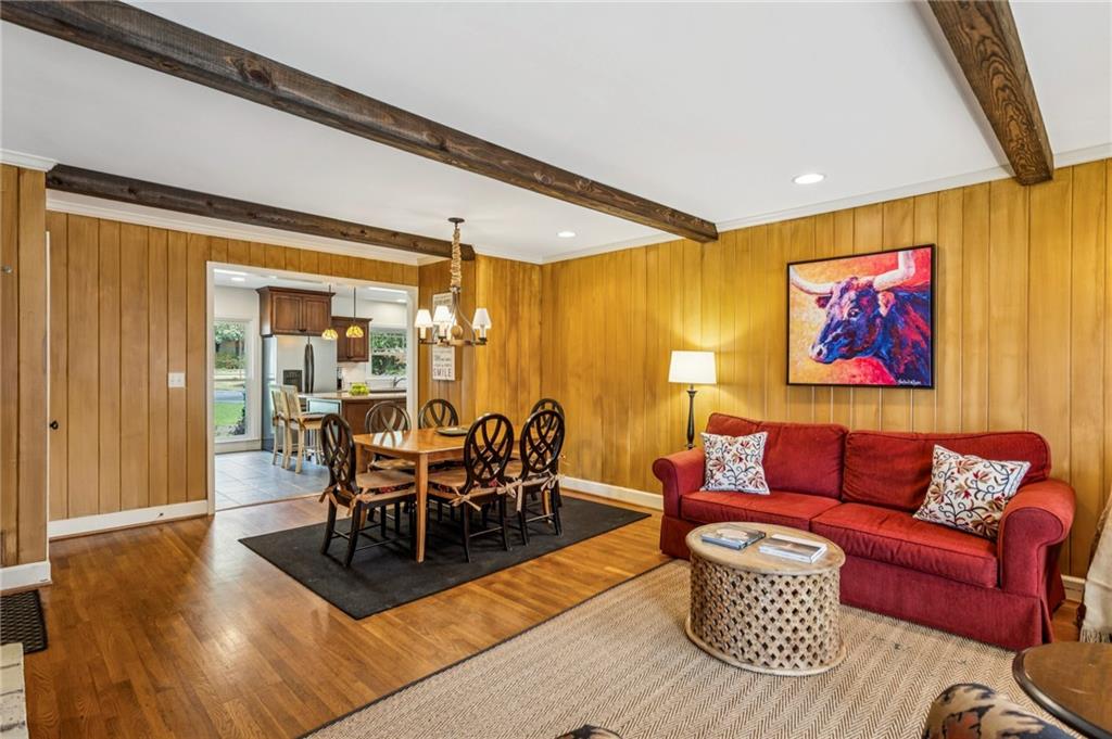 3384 Pine Meadow Road Northwest Atlanta, GA 30327 - Photo 16 of 56 a living room with furniture and wooden floor