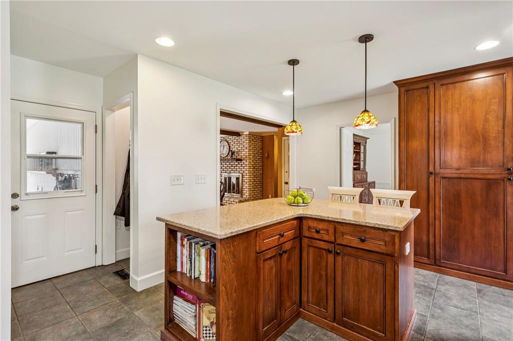 3384 Pine Meadow Road Northwest Atlanta, GA 30327 - Photo 20 of 56 a bathroom with a sink a vanity and a mirror
