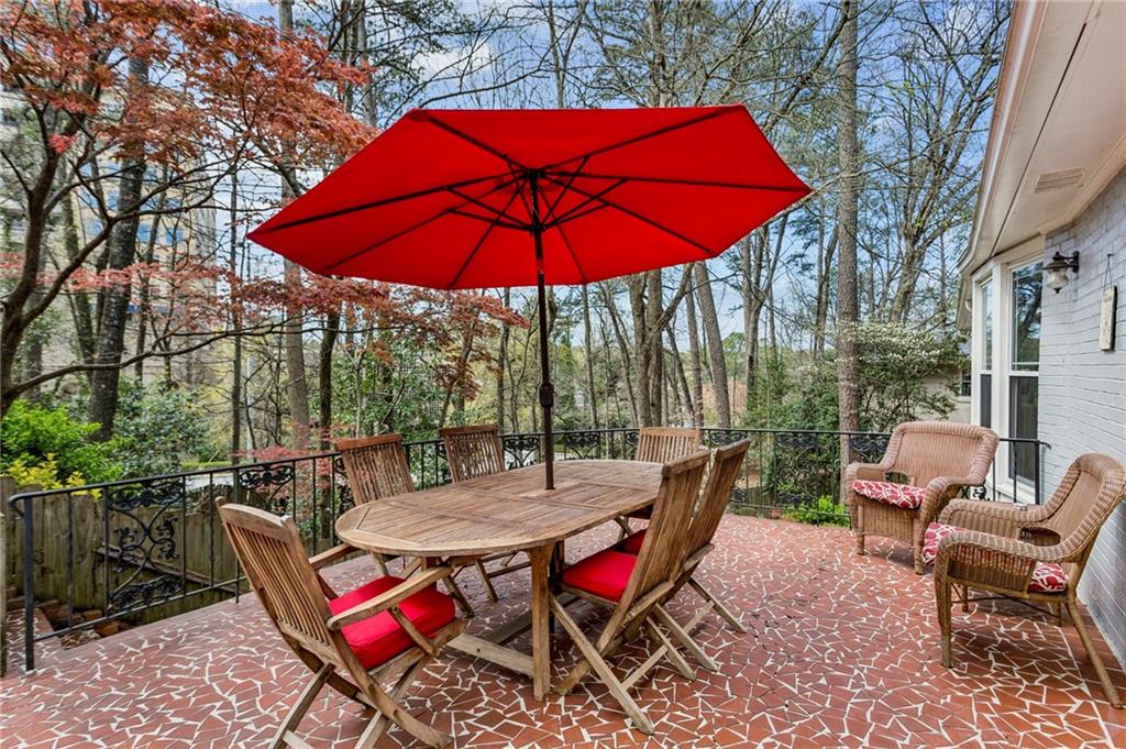 3384 Pine Meadow Road Northwest Atlanta, GA 30327 - Photo 27 of 56 an outdoor sitting area with furniture and wooden deck