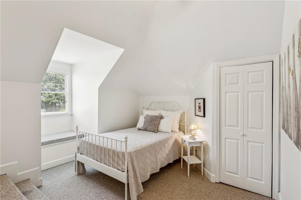 3384 Pine Meadow Road Northwest Atlanta, GA 30327 - Photo 37 of 56 a bedroom with a bed and a window