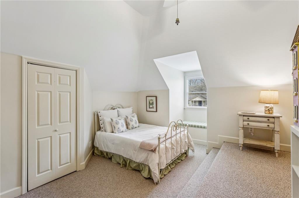 3384 Pine Meadow Road Northwest Atlanta, GA 30327 - Photo 38 of 56 a bedroom with a bed and a table