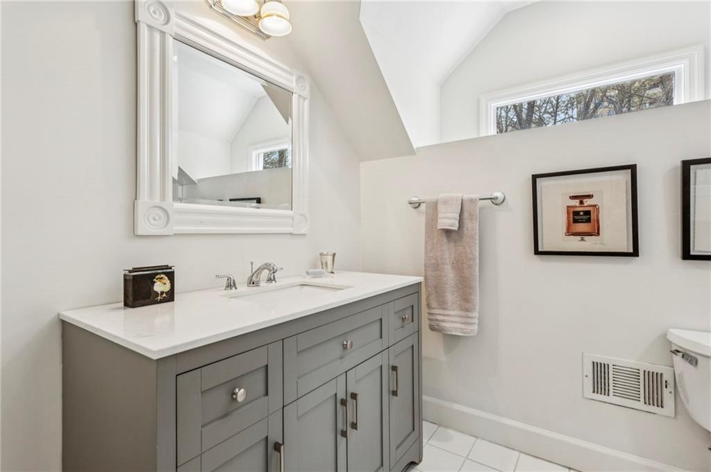 3384 Pine Meadow Road Northwest Atlanta, GA 30327 - Photo 39 of 56 a bathroom with a sink and a mirror