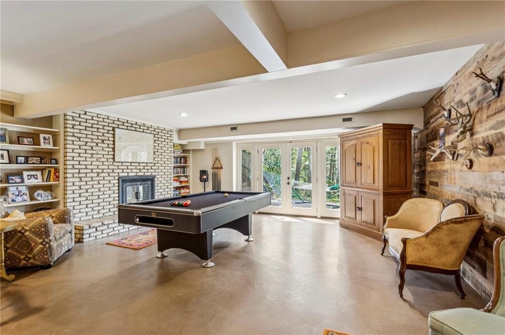 3384 Pine Meadow Road Northwest Atlanta, GA 30327 - Photo 41 of 56 a living room with furniture and a wooden floor