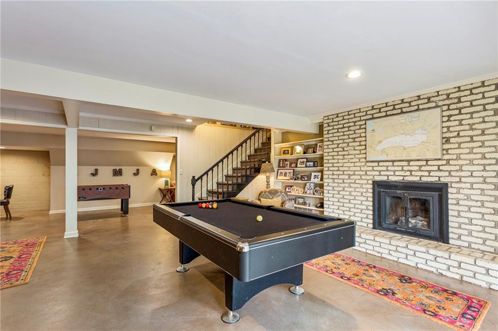 3384 Pine Meadow Road Northwest Atlanta, GA 30327 - Photo 42 of 56 a living room with furniture pool table and rug