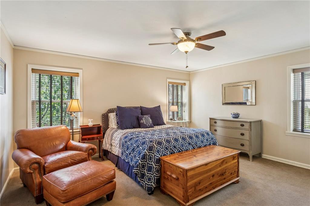 3384 Pine Meadow Road Northwest Atlanta, GA 30327 - Photo 50 of 56 a bedroom with a bed and a dresser