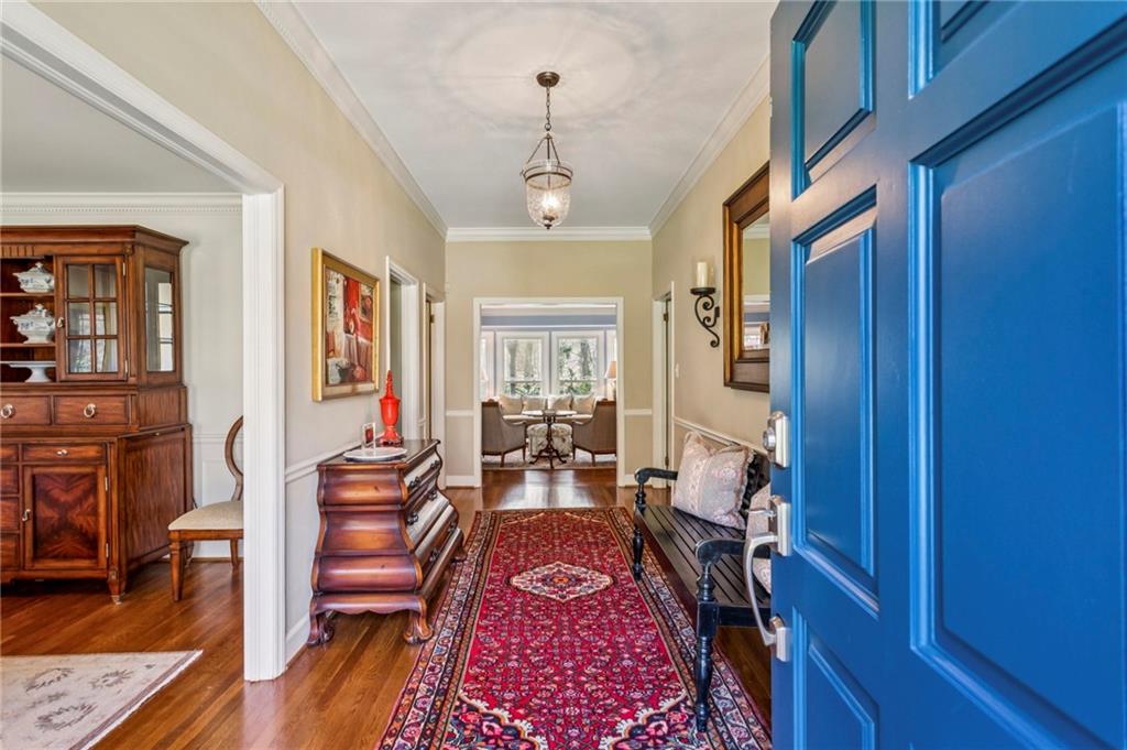 3384 Pine Meadow Road Northwest Atlanta, GA 30327 - Photo 5 of 56 a view of a livingroom with furniture wooden floor and windows