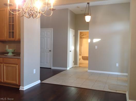 4631 Paxton Road Akron, OH 44321 - Photo 3 of 18 Entrance leading to Dining Area, Guest Bath and Bedroom to the right and straight ahead to Great Room