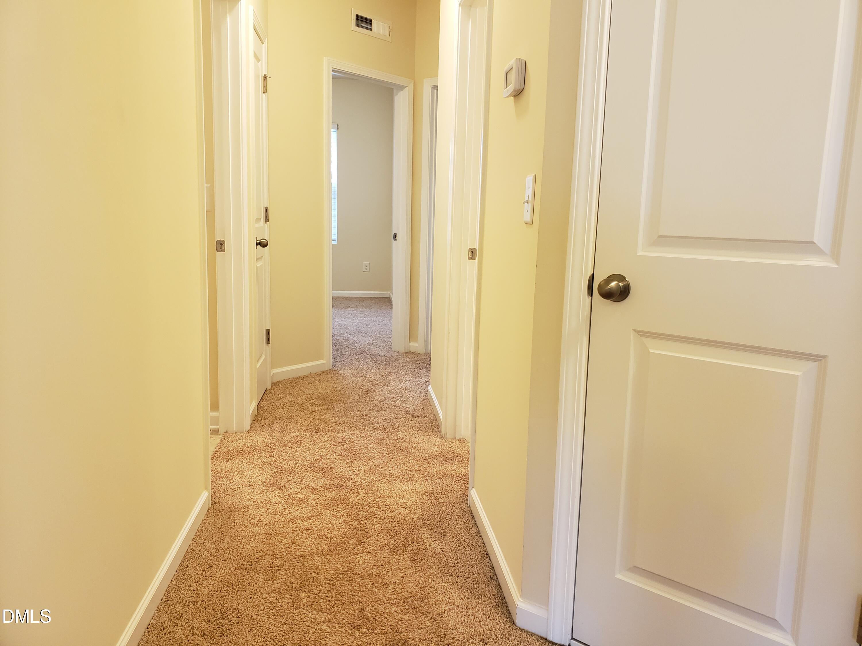 16 Grifton Place Durham, NC 27704 - Photo 11 of 16 a view of a bathroom from a hallway