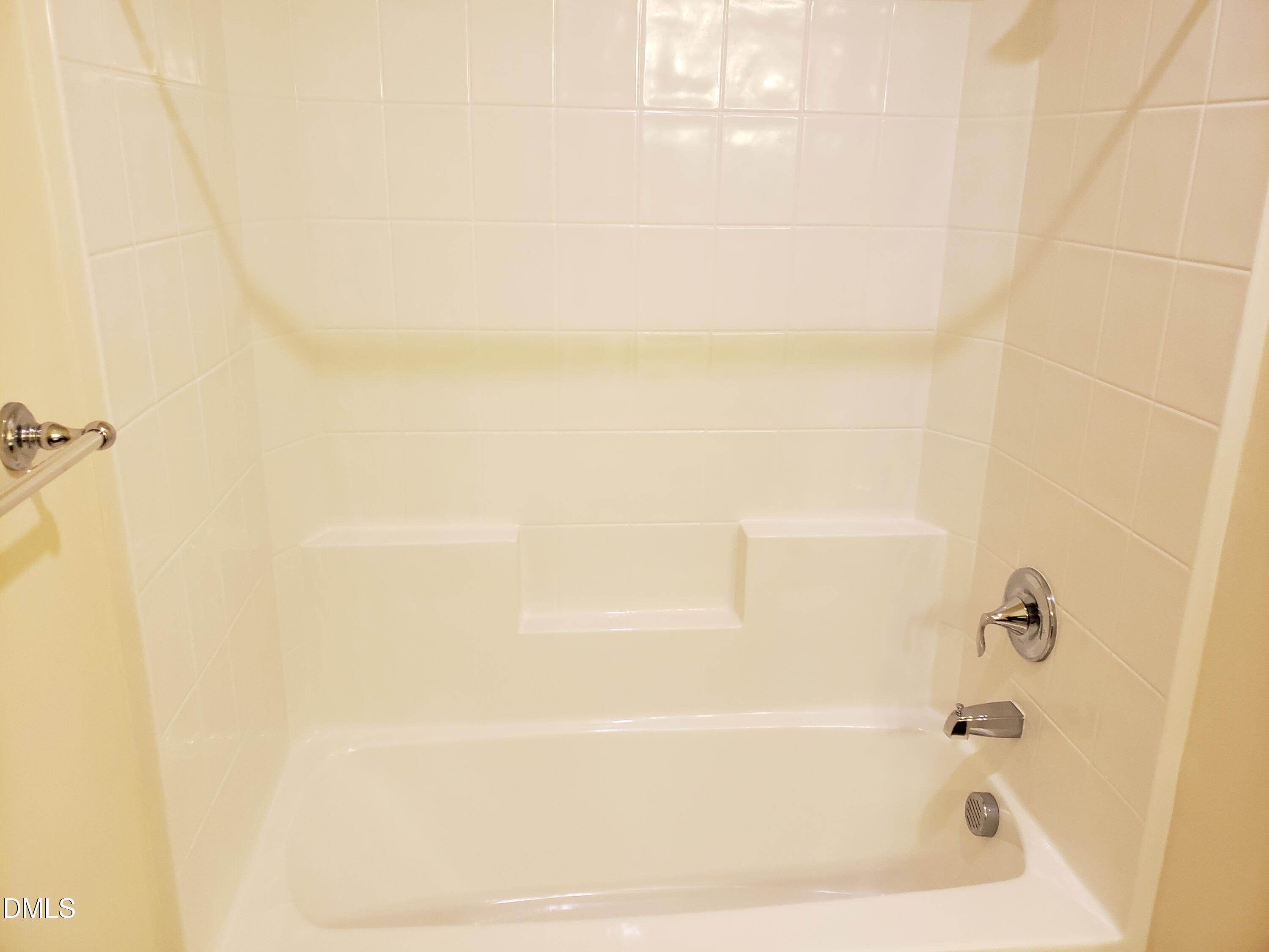 16 Grifton Place Durham, NC 27704 - Photo 12 of 16 a bathroom with a bathtub