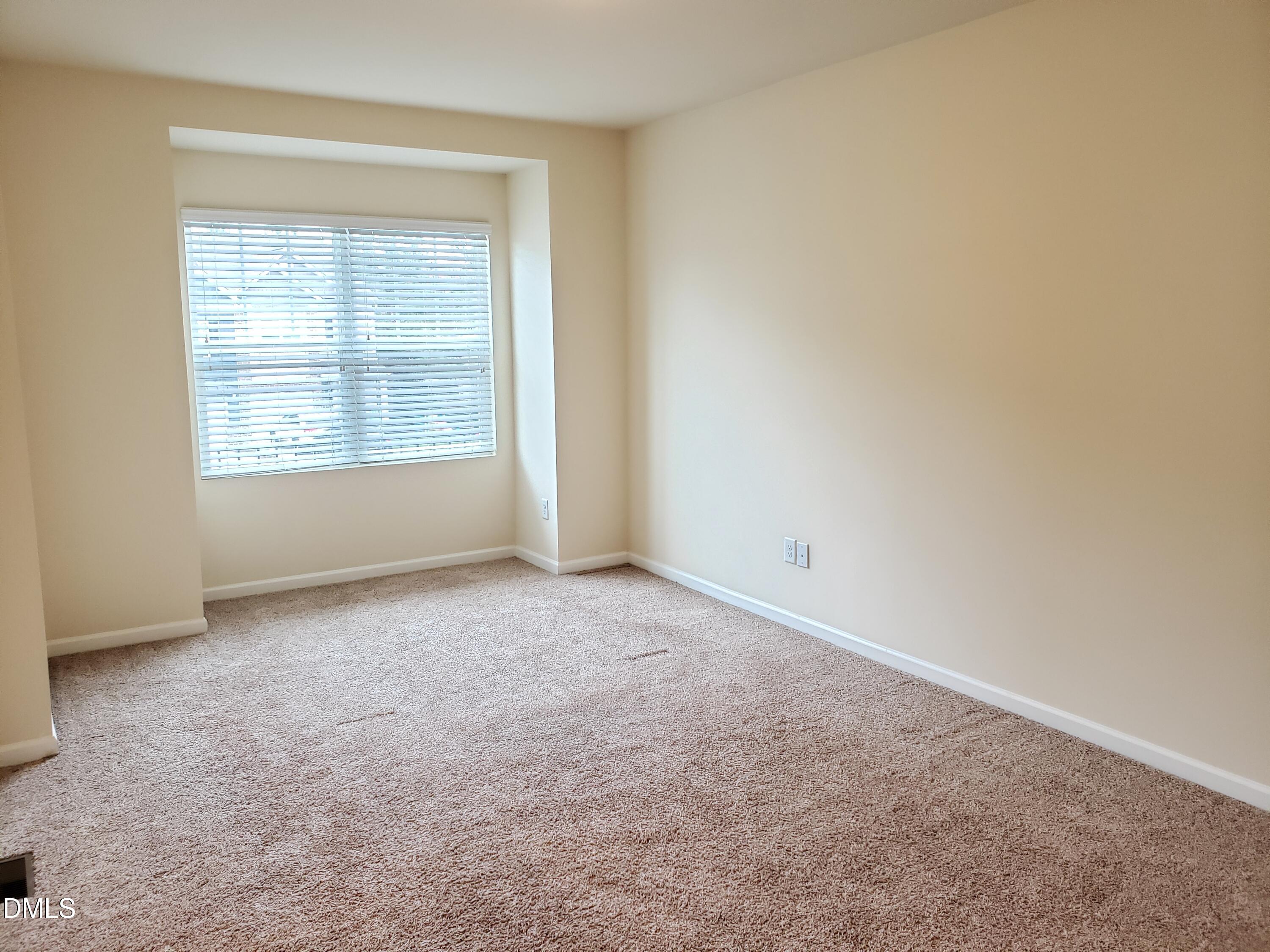 16 Grifton Place Durham, NC 27704 - Photo 16 of 16 an empty room with a window