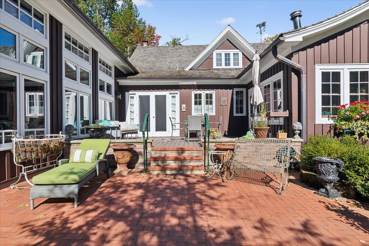 345 Sylvan Road Lake Bluff, IL 60044 - Photo 12 of 55 a view of a house with swimming pool and sitting area