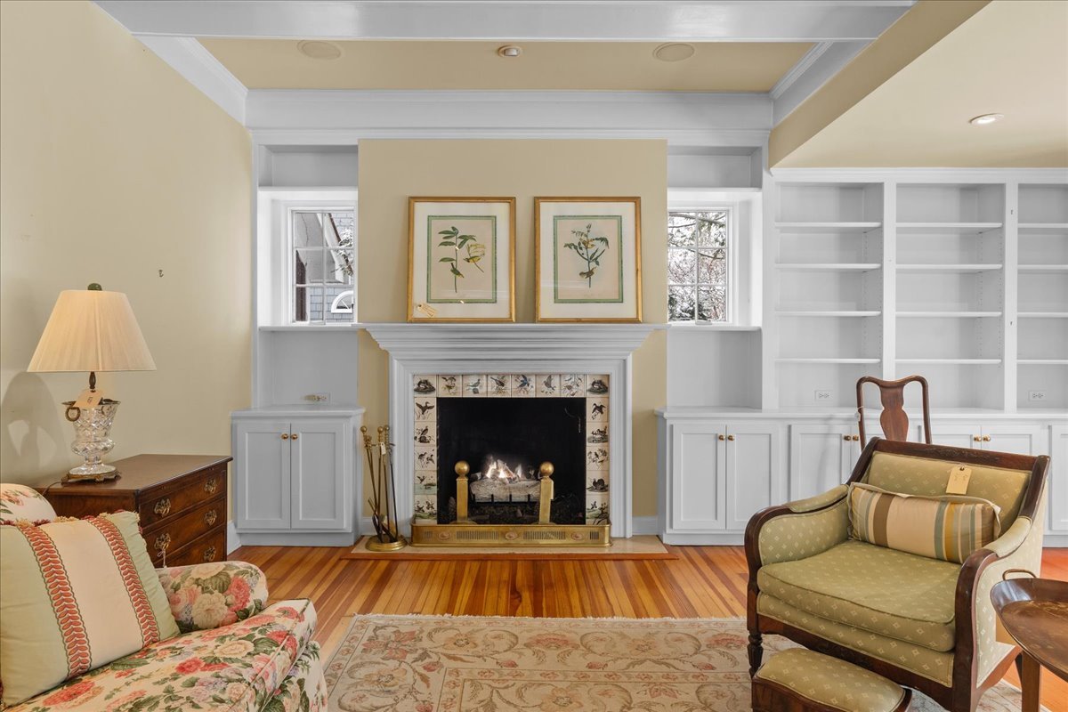 345 Sylvan Road Lake Bluff, IL 60044 - Photo 21 of 55 a living room with furniture and a fireplace