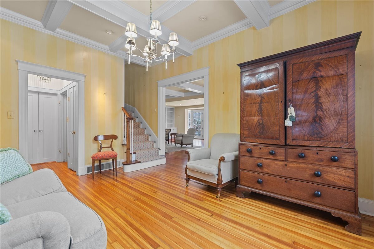 345 Sylvan Road Lake Bluff, IL 60044 - Photo 26 of 55 a living room with furniture and a chandelier