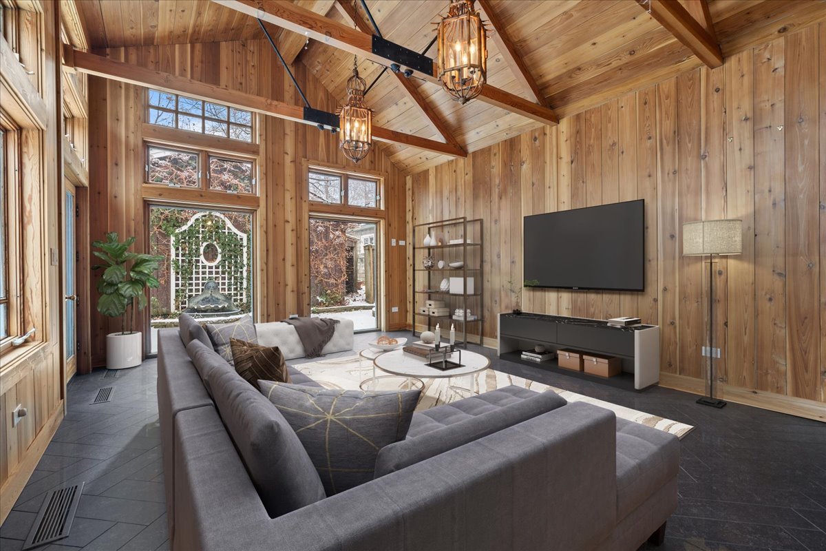 345 Sylvan Road Lake Bluff, IL 60044 - Photo 41 of 55 a living room with furniture and a flat screen tv