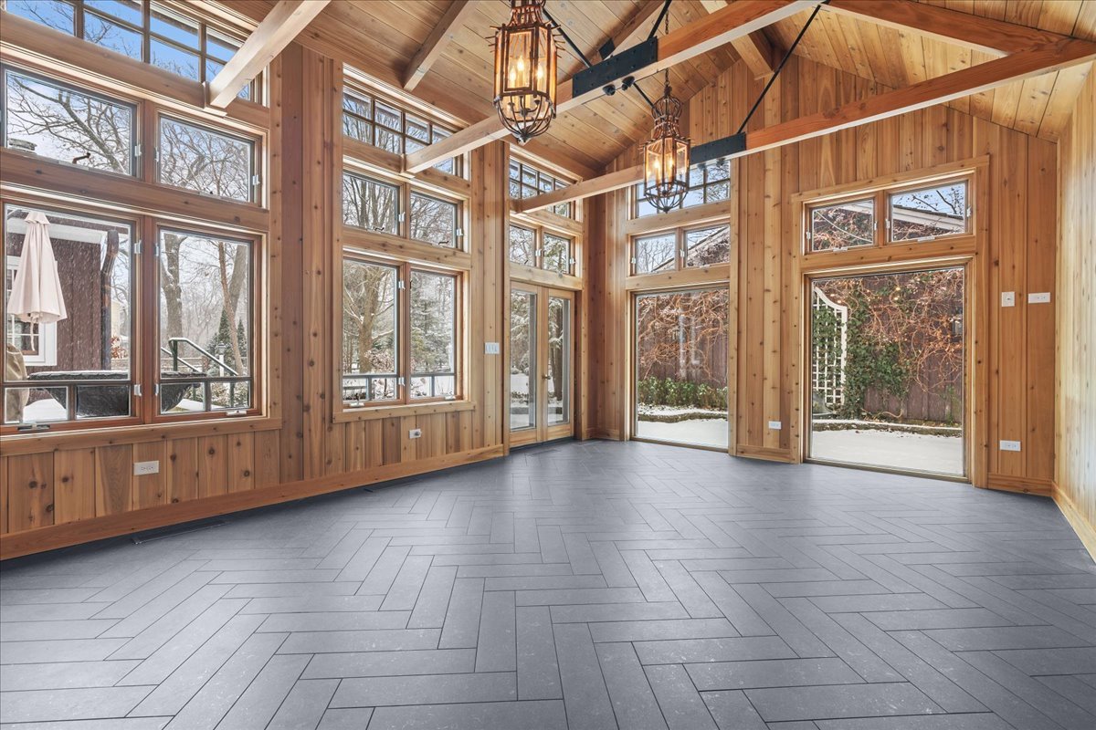 345 Sylvan Road Lake Bluff, IL 60044 - Photo 43 of 55 a view of an empty room with wooden floor and windows