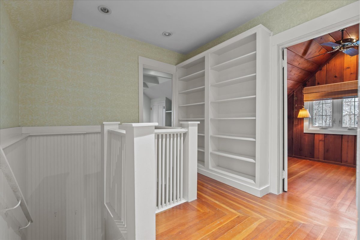 345 Sylvan Road Lake Bluff, IL 60044 - Photo 45 of 55 a view of a room that has a large window and wooden floor