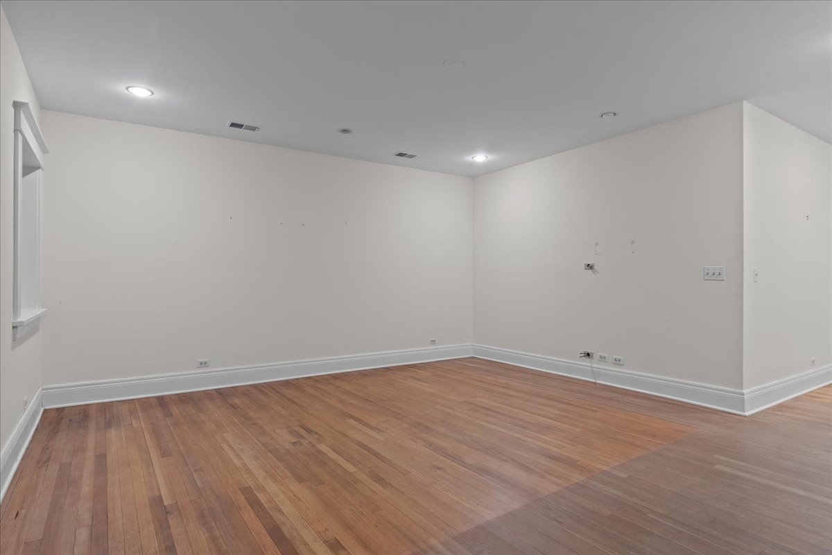 345 Sylvan Road Lake Bluff, IL 60044 - Photo 51 of 55 a view of room with wooden floor and natural light