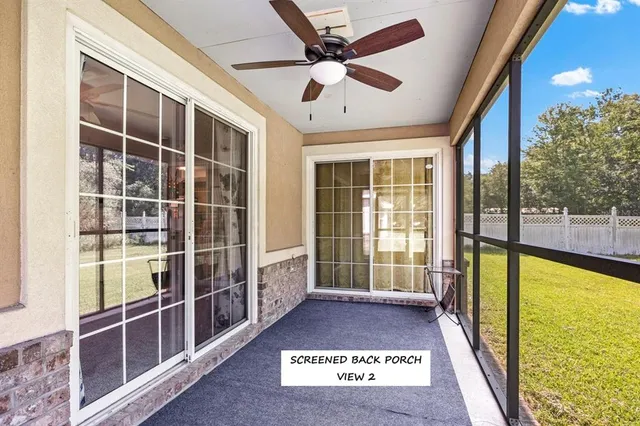 a view of empty room with windows