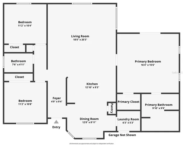 a view of a house with a yard porch and tree