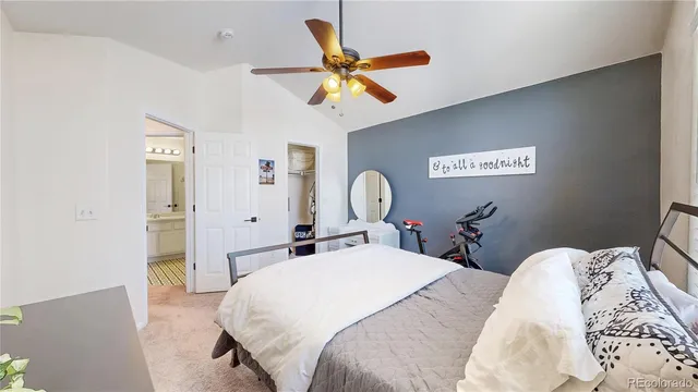 a bedroom with bed and window