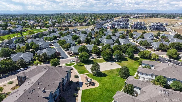 an aerial view of a house with a garden