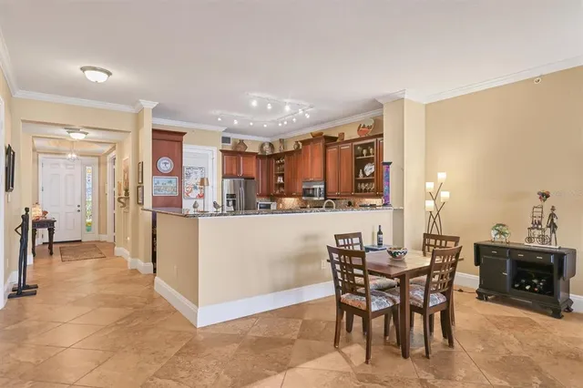 a kitchen with a sink stove and refrigerator