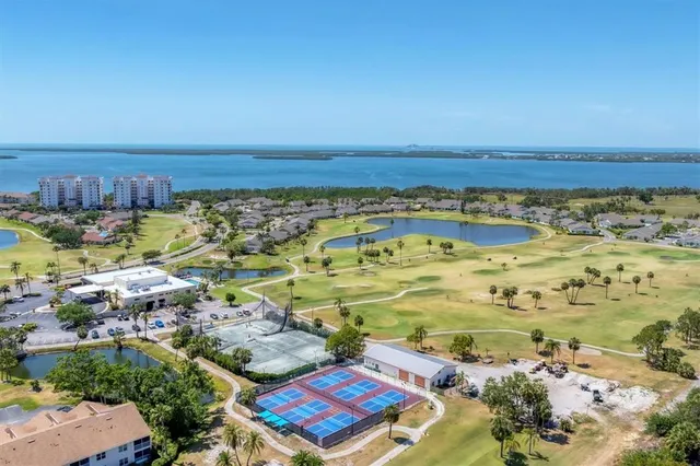 a view of a city with lawn chairs