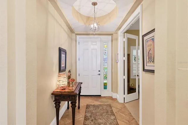 a view of a kitchen from the hallway